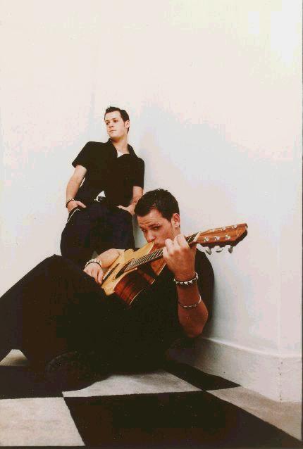 I think it's Benji with the guitar..... i think